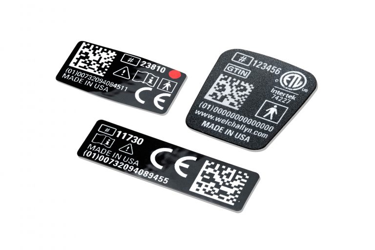 Digitally printed graphic overlay with adhesive